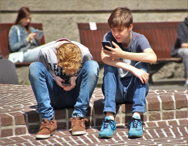 Kids on their phone.jpg